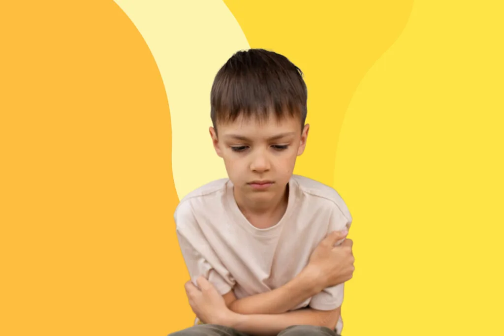 anxious child with hand in his chin