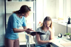 mother questions teenager about grades how to deal with strict parents at 14