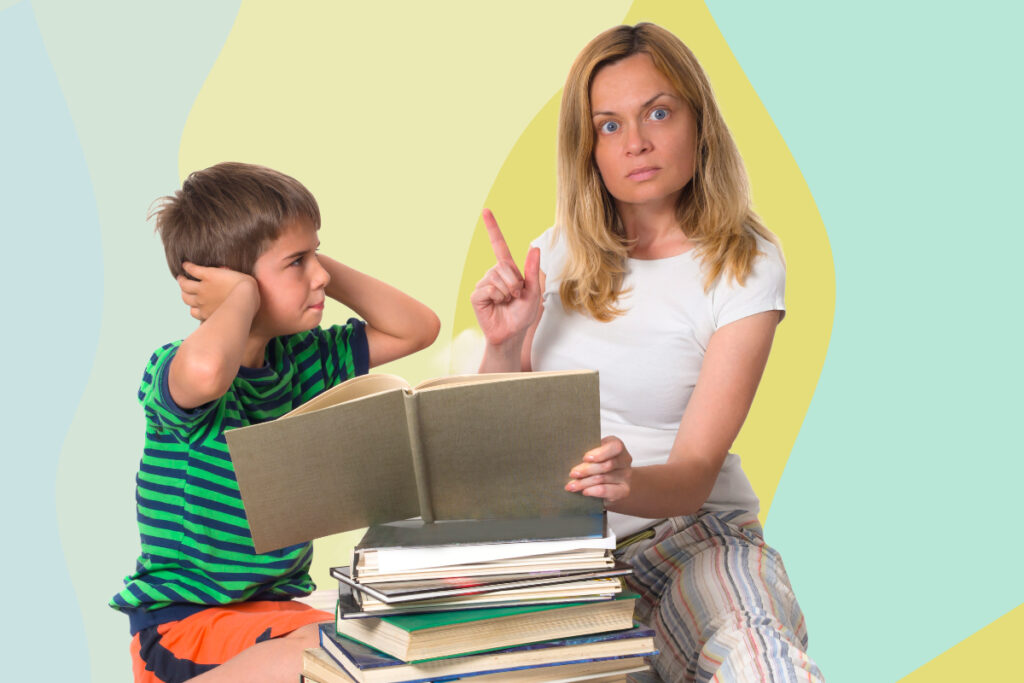 A defiant child covers his ears while a woman tries to teach from a book to him.
