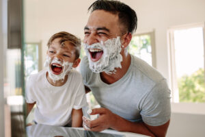 son mimics dad putting shaving cream on face