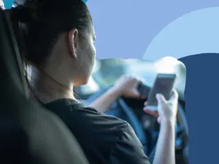 teenager girl texts while driving