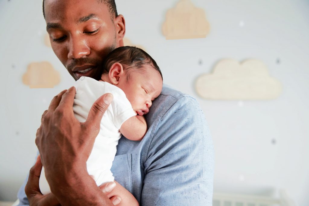 man puts sleeping infant on shoulder - are my parents overprotective or just protective