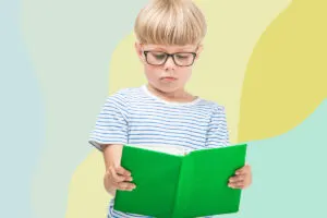 boy having difficulty studying book
